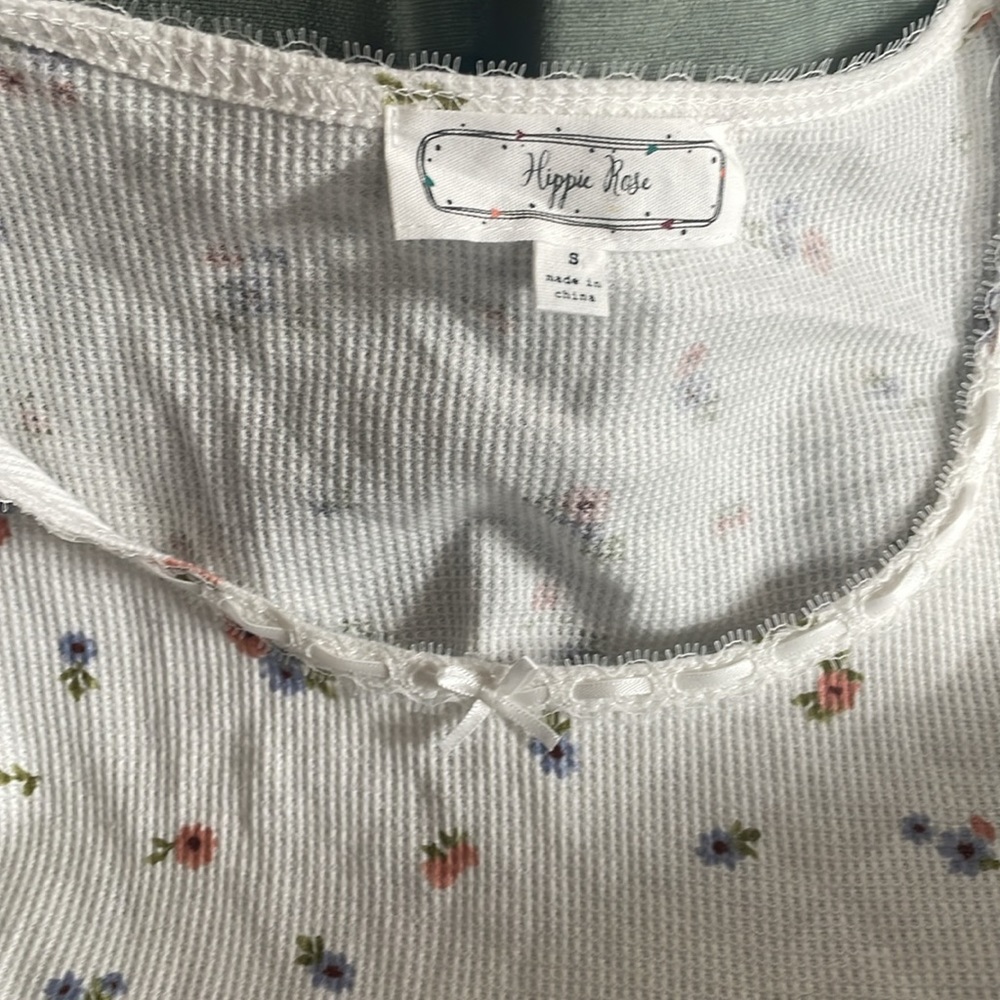 This shirt is from hippie rose. It’s been wore once.